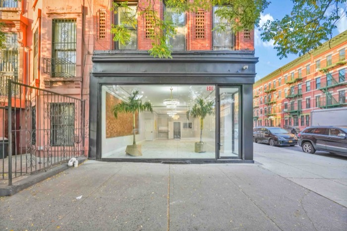 Straight-on view of the storefront from across the sidewalk